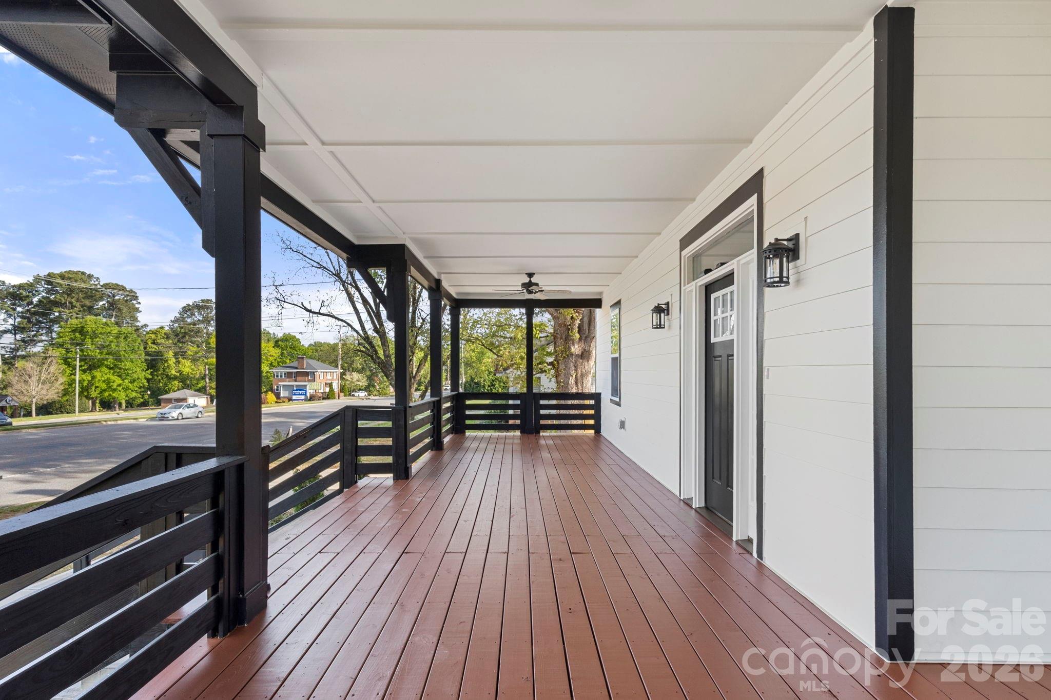 918 North New Hope Road Gastonia, NC 28054 - Photo 4 of 37 a view of a balcony with wooden floor