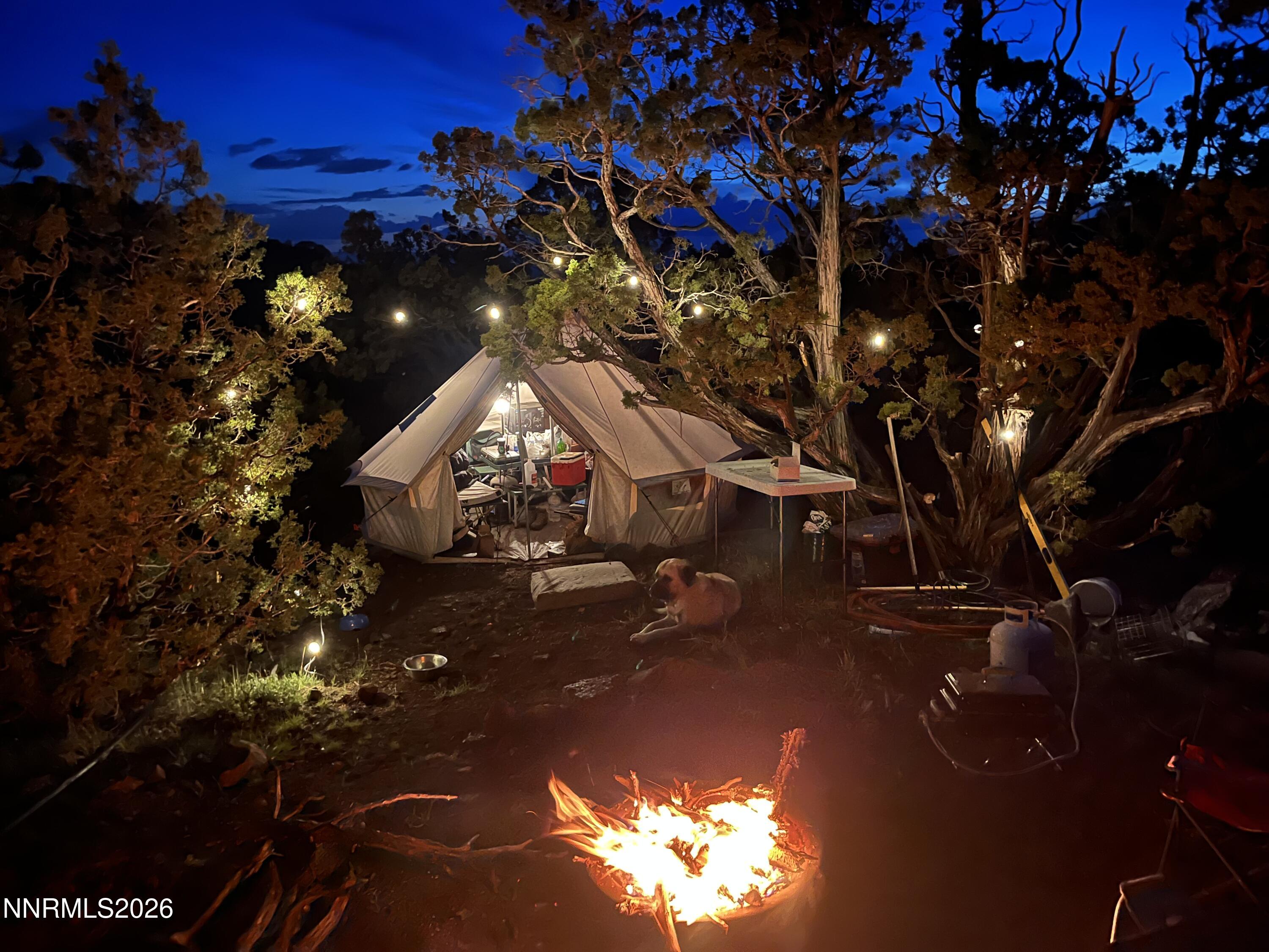 0 Microwave Road, Unit 1 Reno, NV 89510 - Photo 19 of 20 a backyard of a house with table and chairs