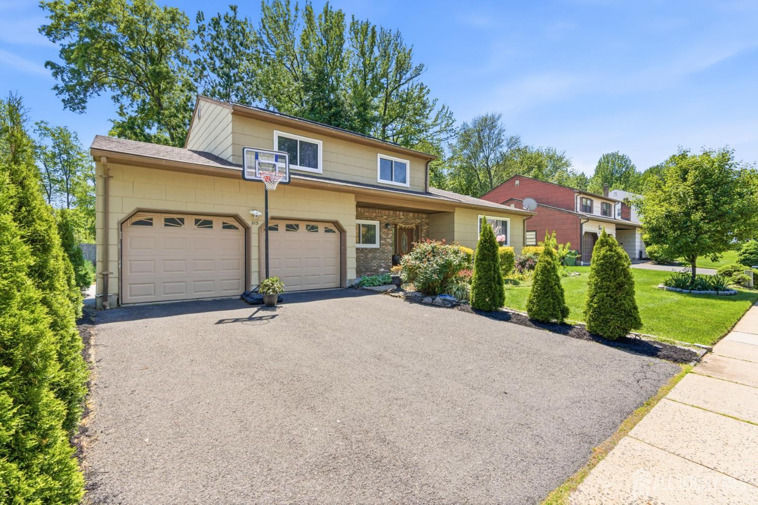 213 Normandy Road Edison, NJ 08820 - Photo 2 of 45 front view of a house with a yard