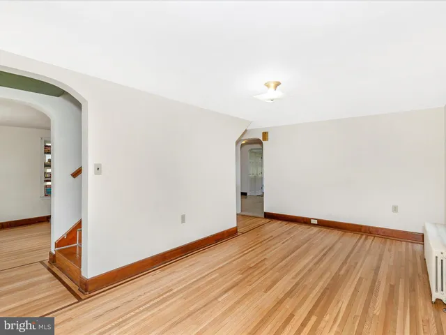 a bathroom with a sink a mirror and a shower