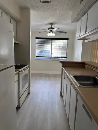 $1,700 | 5760 Rock Island Road, Unit 304, Tamarac, FL 33319