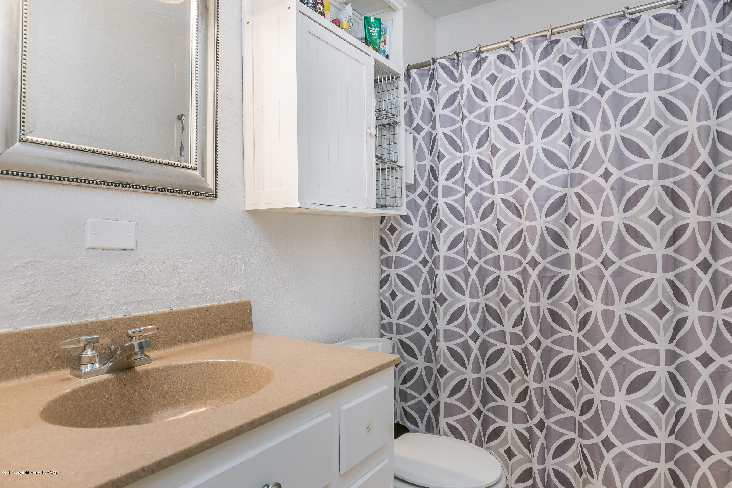 1608 Southwest 48th Avenue Amarillo, TX 79110 - Photo 11 of 16 Hall Bathroom