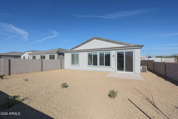 a front view of a house with yard