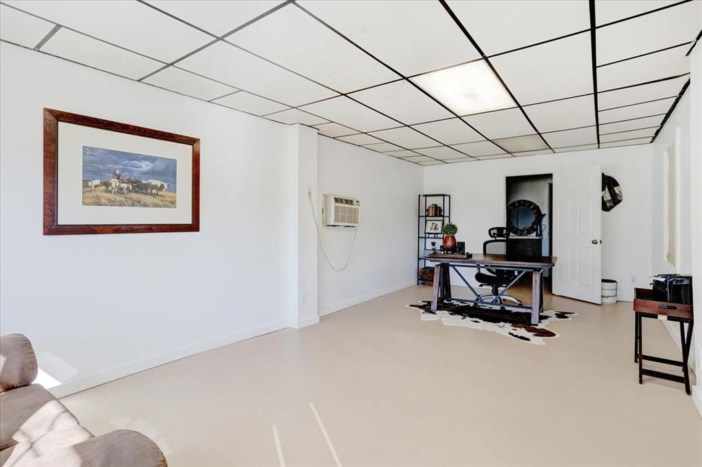 402 West Sam Rayburn Drive Ector, TX 75439 - Photo 24 of 40 a view of a workspace with furniture