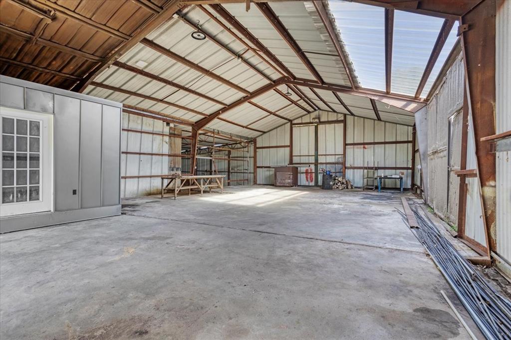 402 West Sam Rayburn Drive Ector, TX 75439 - Photo 34 of 40 a view of a garage