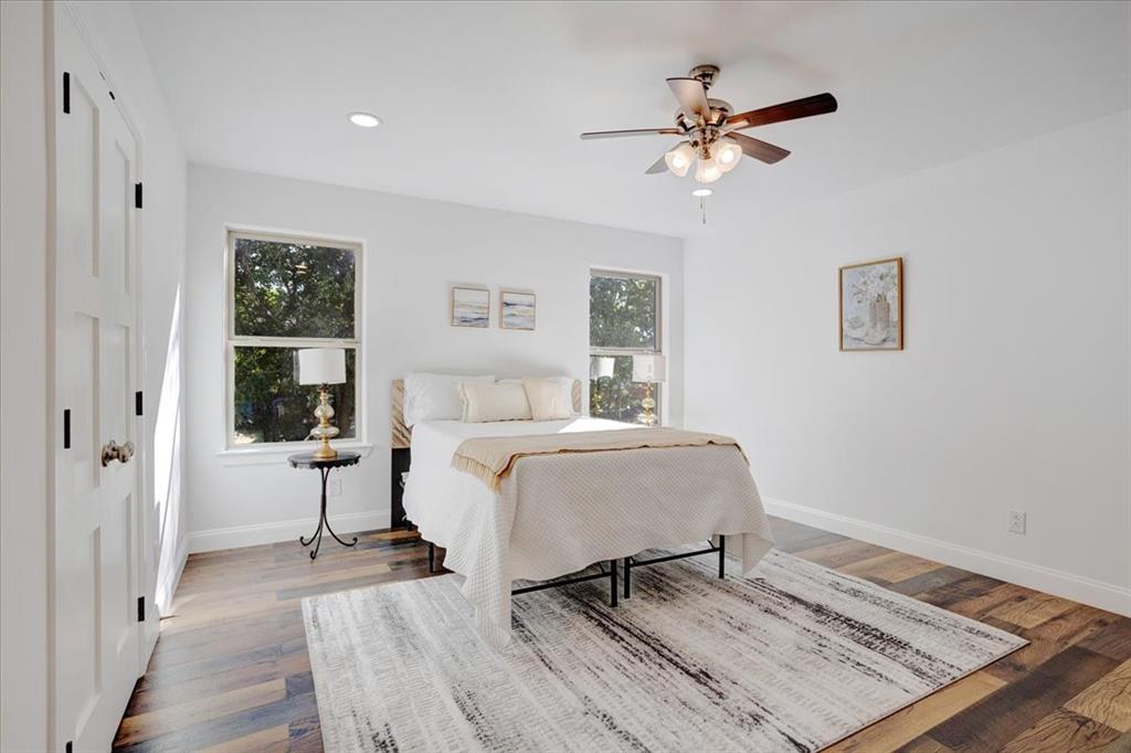 402 West Sam Rayburn Drive Ector, TX 75439 - Photo 10 of 40 a bedroom with a bed and a window