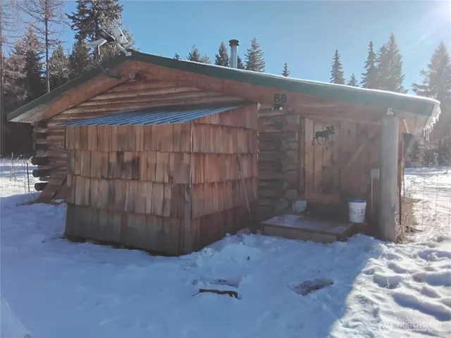 a view of a backyard of snow