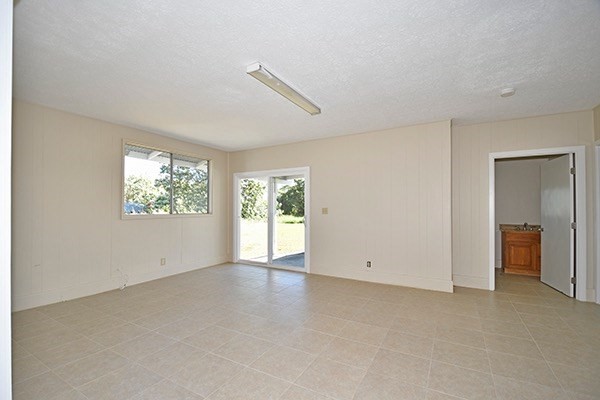 17-239 Volcano Road Keaau, HI 96749 - Photo 20 of 25 an empty room with a empty space and windows