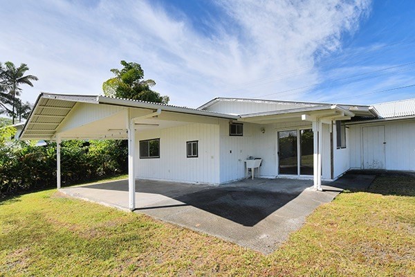 17-239 Volcano Road Keaau, HI 96749 - Photo 22 of 25 a front view of a house with a yard