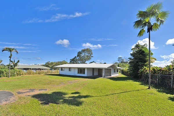 17-239 Volcano Road Keaau, HI 96749 - Photo 25 of 25 a front view of a house with a big yard