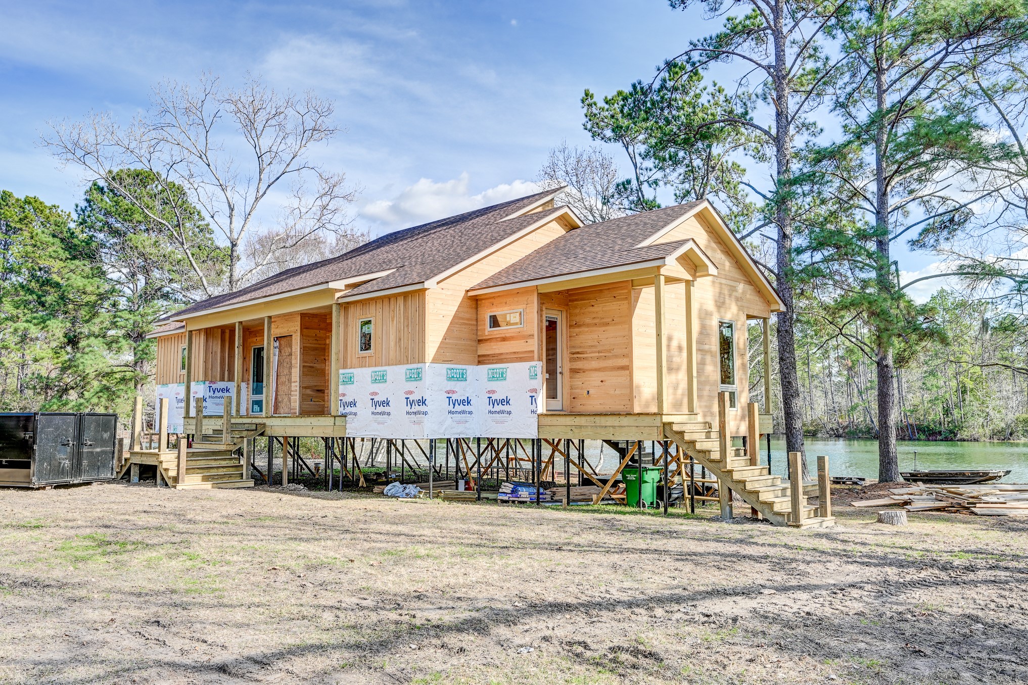 53 Smith Loop North Cleveland, TX 77327 - Photo 27 of 49 a front view of a house with a yard and potted plants