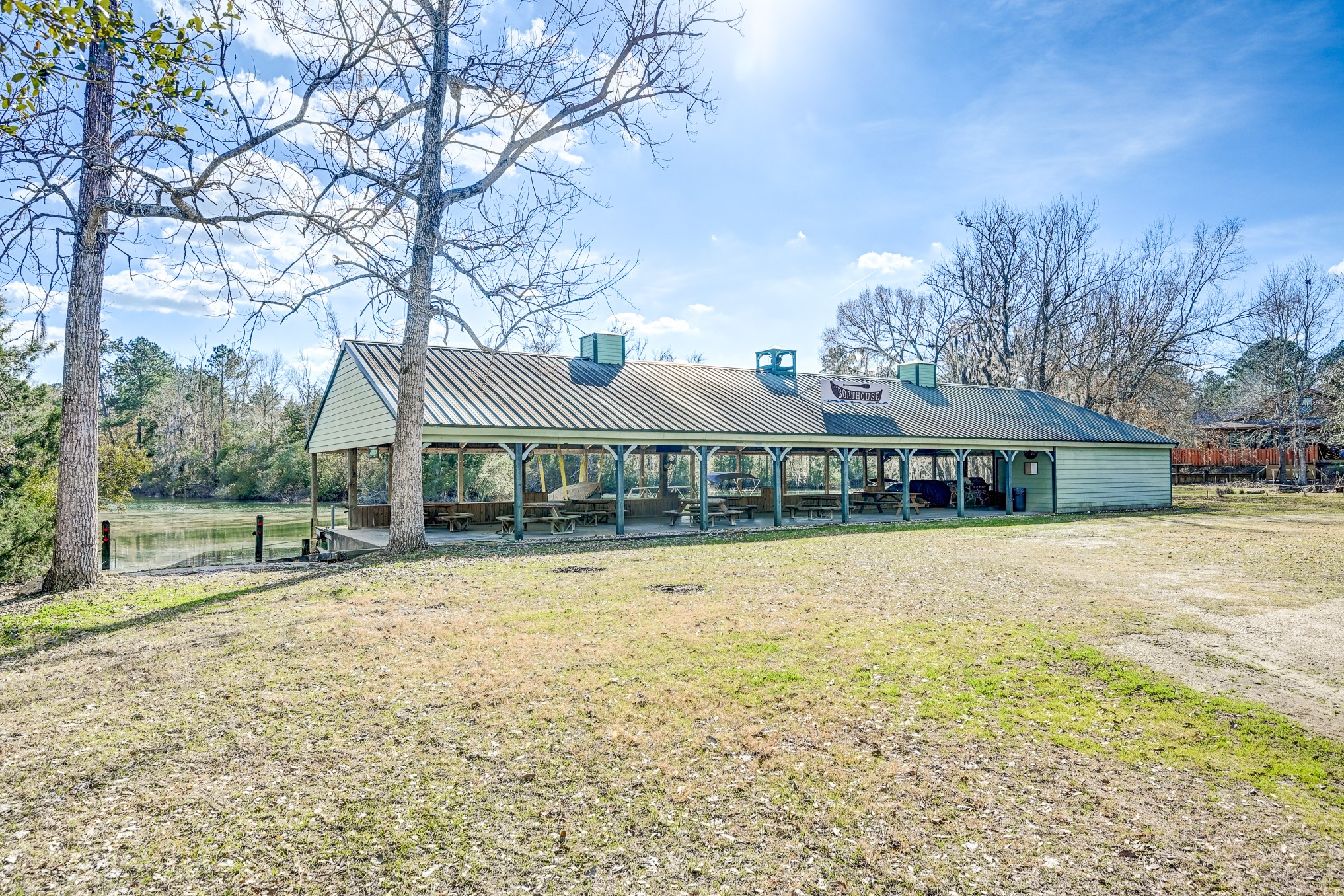 53 Smith Loop North Cleveland, TX 77327 - Photo 28 of 49 a front view of house with yard and tree