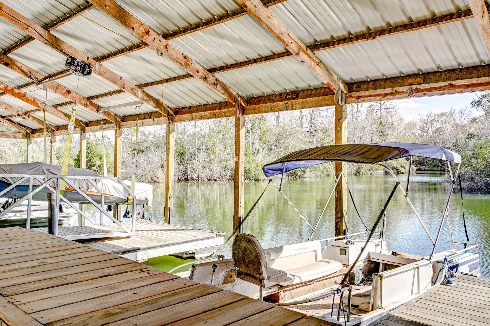 53 Smith Loop North Cleveland, TX 77327 - Photo 32 of 49 a view of a swimming pool with a patio
