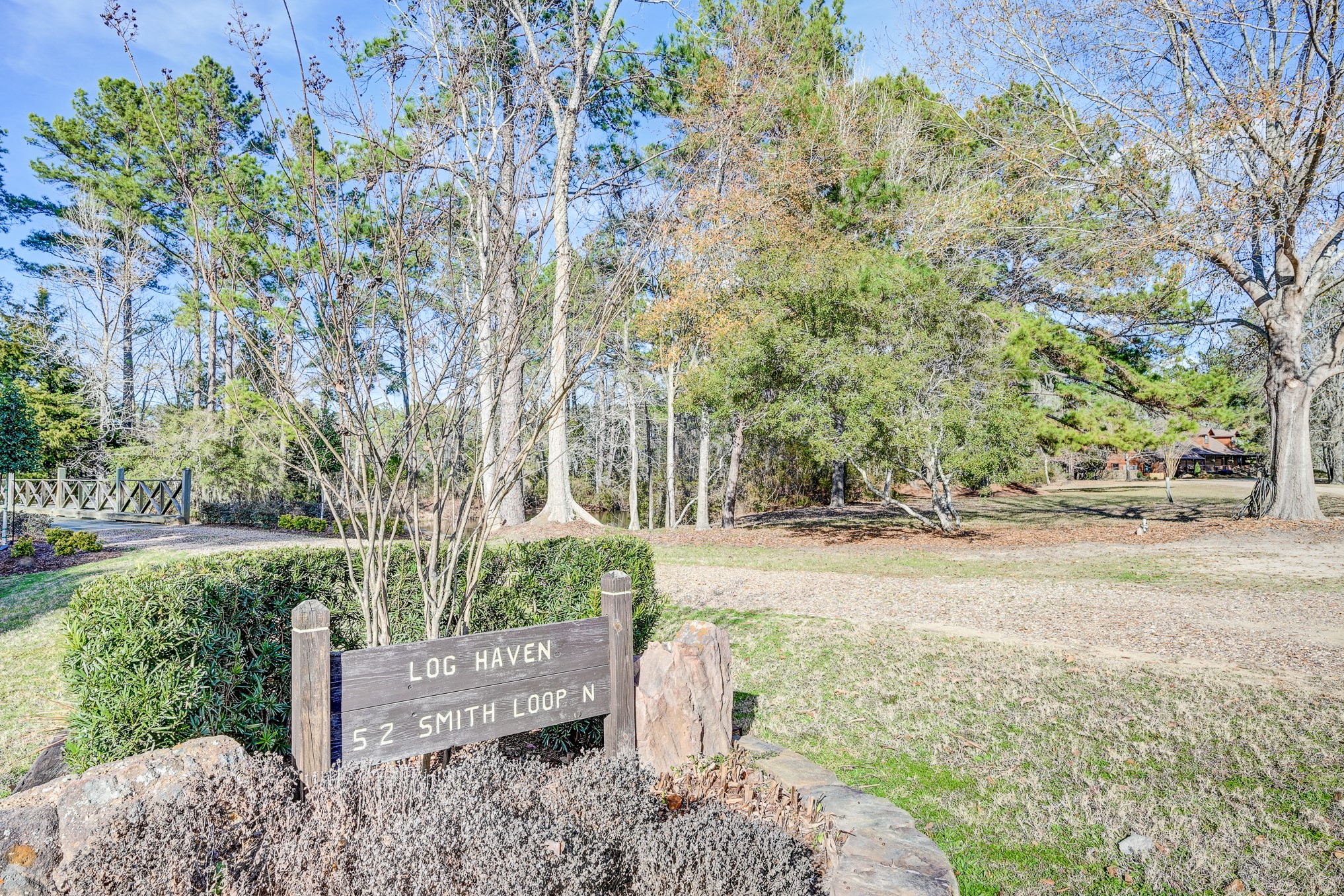 53 Smith Loop North Cleveland, TX 77327 - Photo 36 of 49 a view of yard and tree in back
