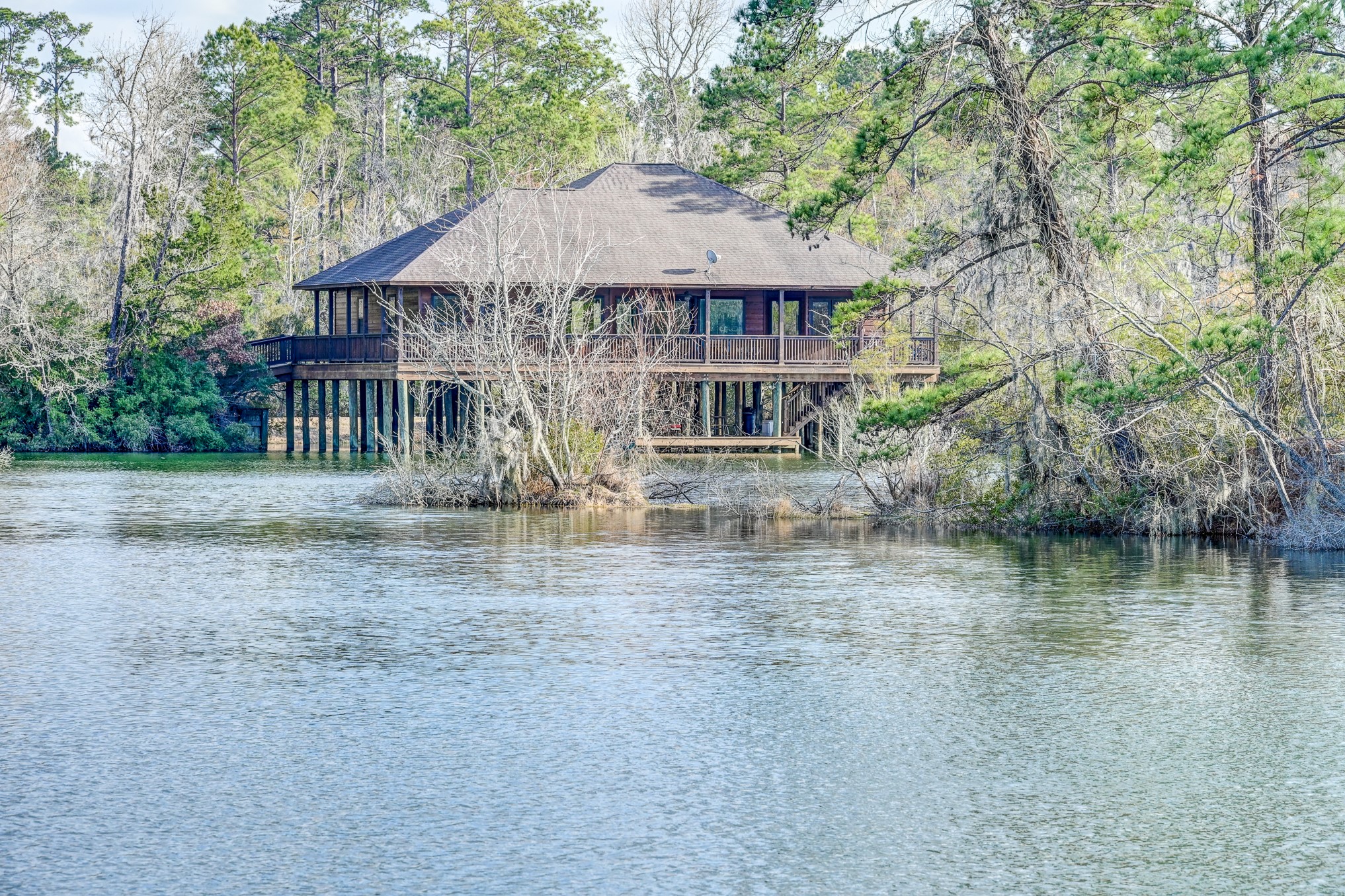 53 Smith Loop North Cleveland, TX 77327 - Photo 37 of 49 a view of a house with yard and sitting area