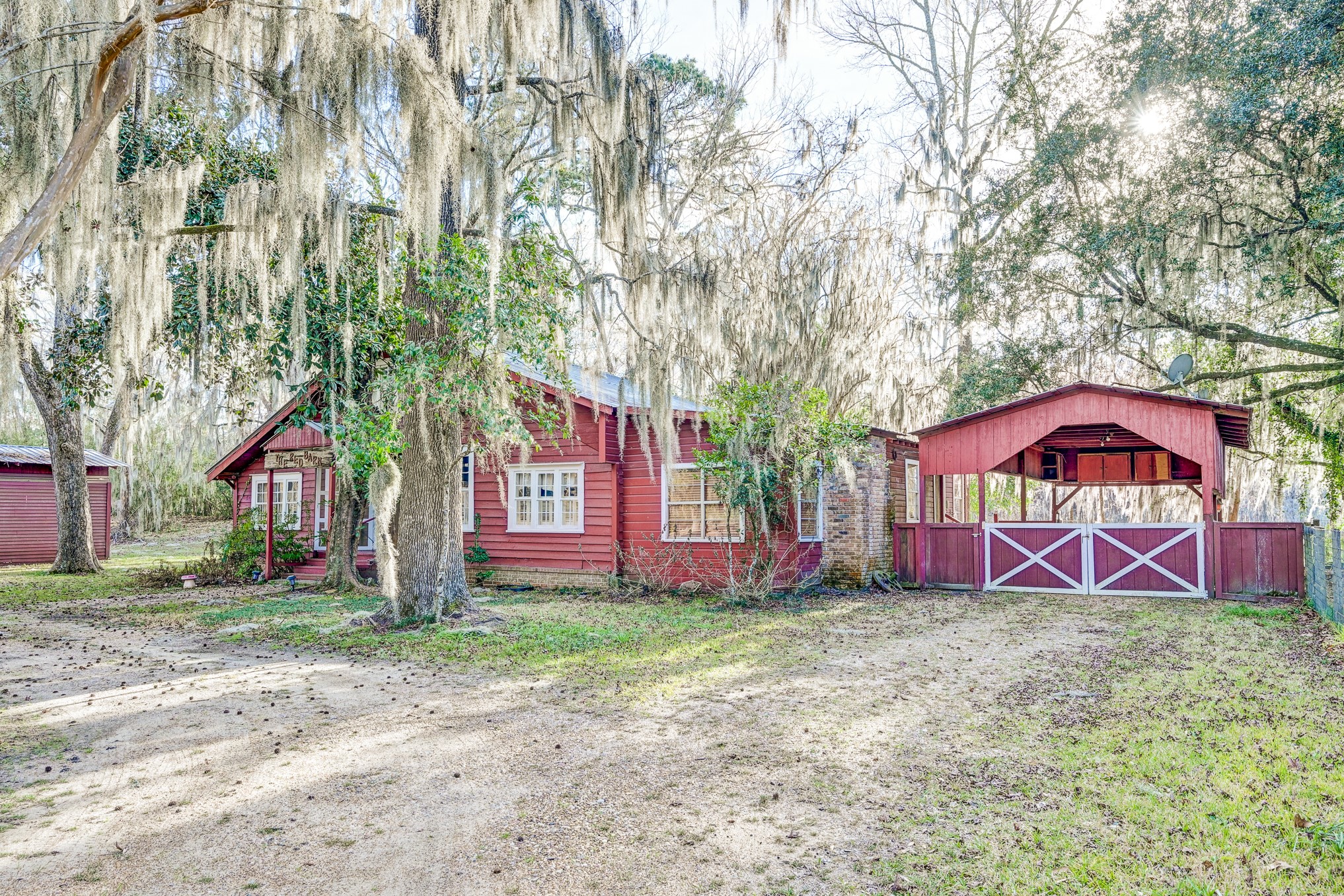 53 Smith Loop North Cleveland, TX 77327 - Photo 40 of 49 a front view of house with yard and trees