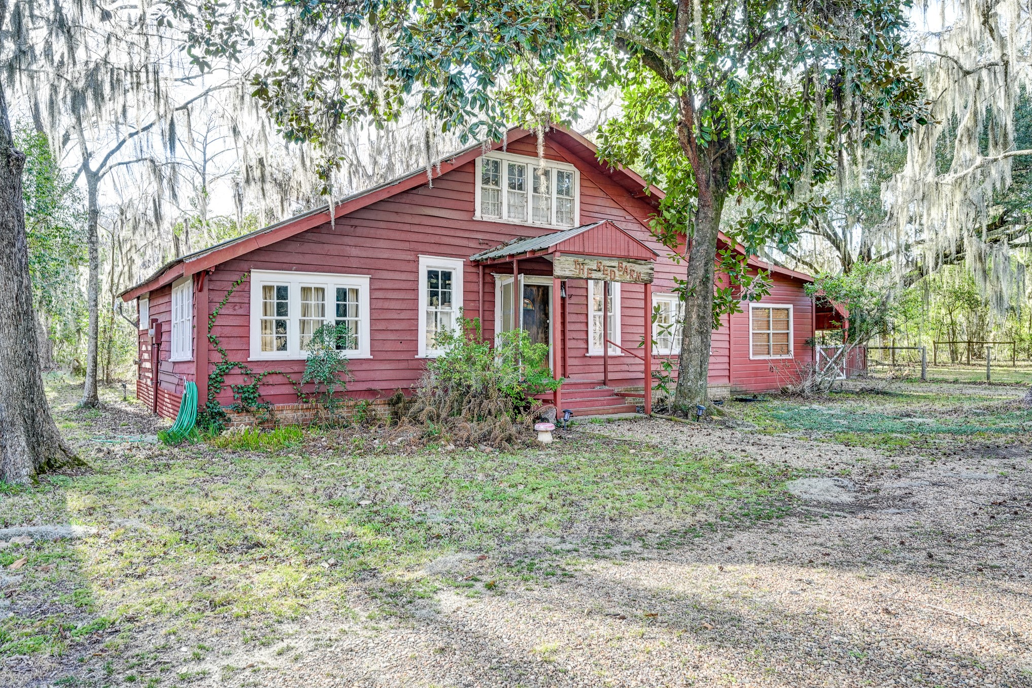 53 Smith Loop North Cleveland, TX 77327 - Photo 41 of 49 a front view of a house with a garden