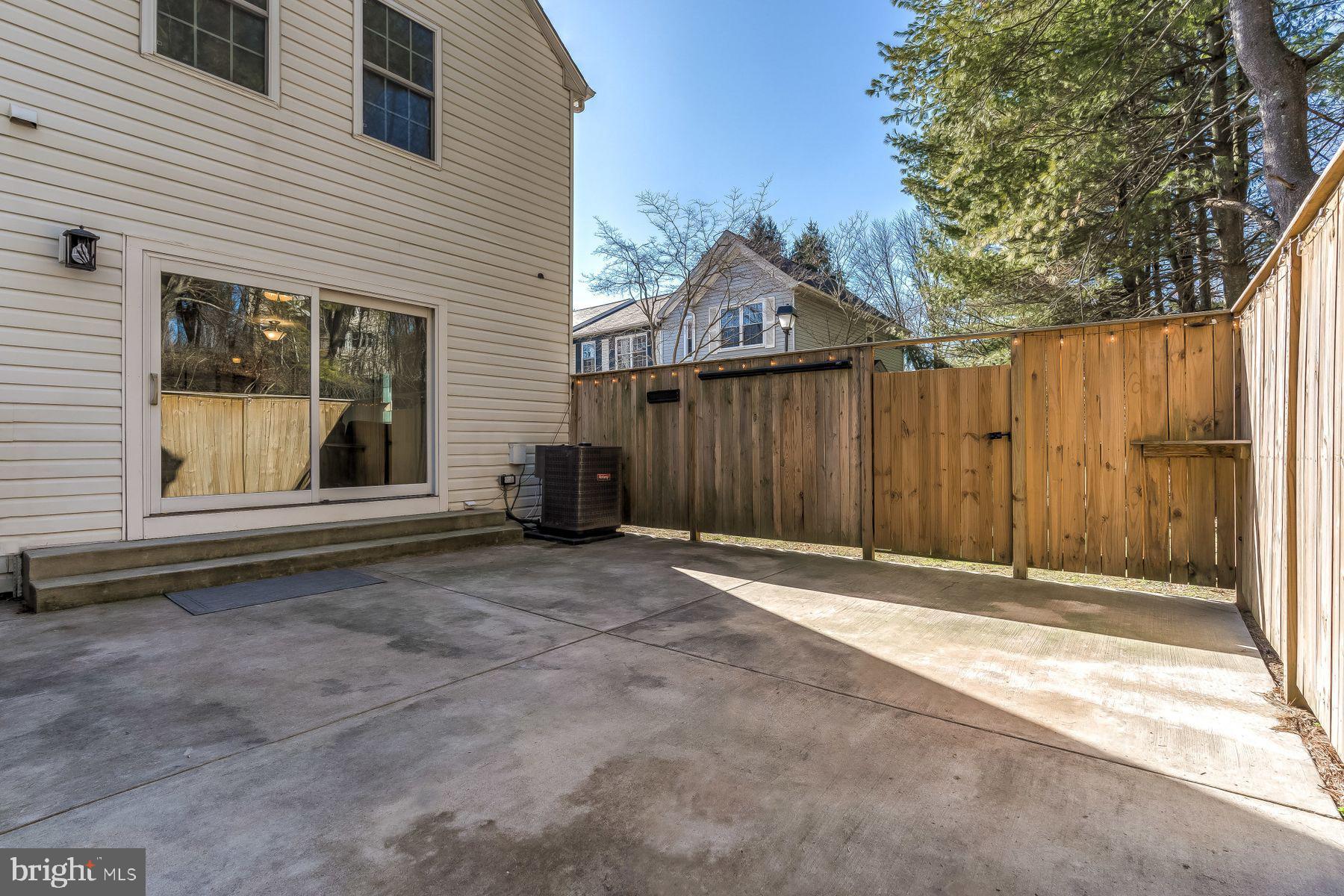 7471 Setting Sun Way Columbia, MD 21046 - Photo 18 of 20 Patio with privacy fence