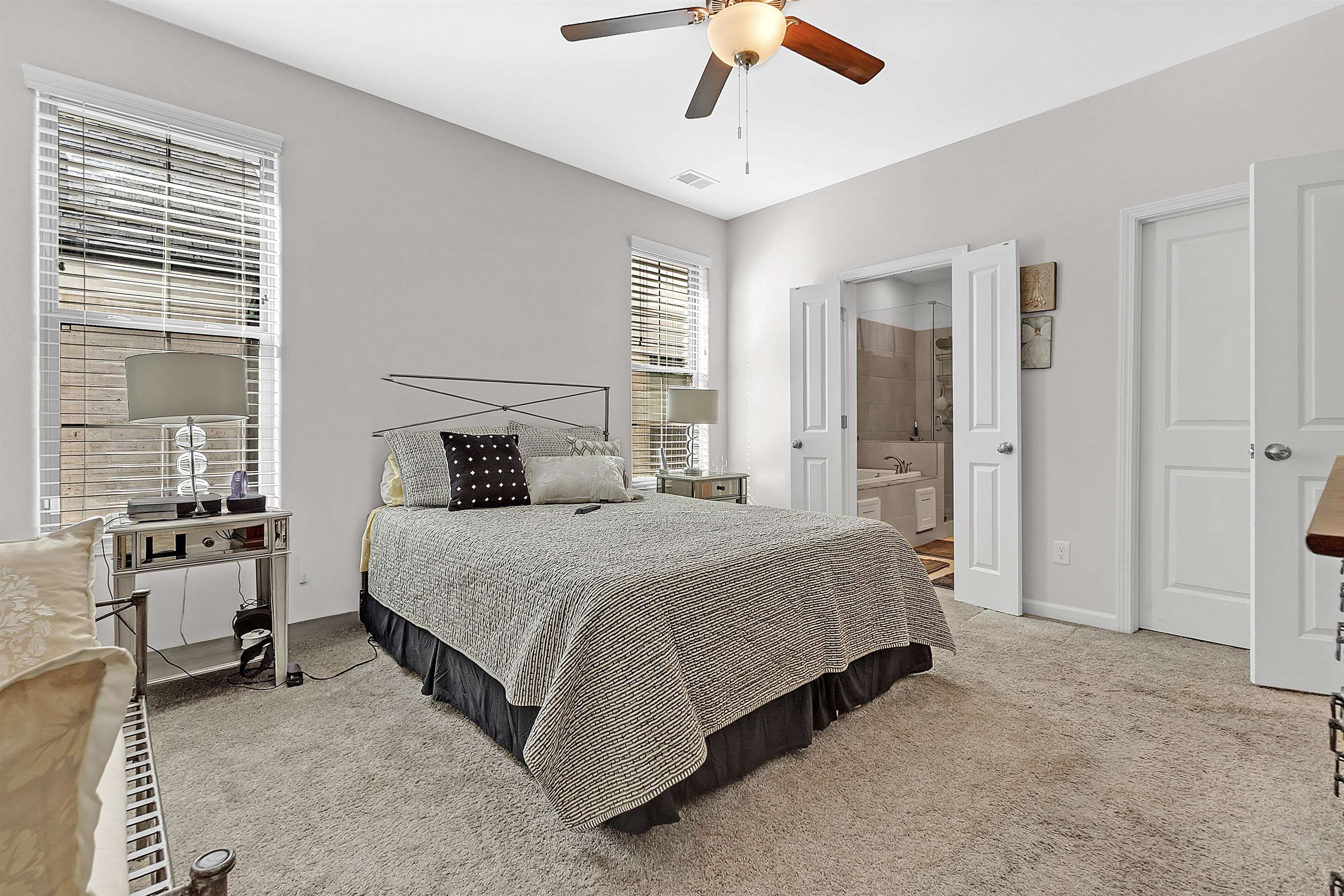 10151 Macon Road Cordova, TN 38018 - Photo 18 of 36 Bedroom featuring connected bathroom, light carpet, and a ceiling fan