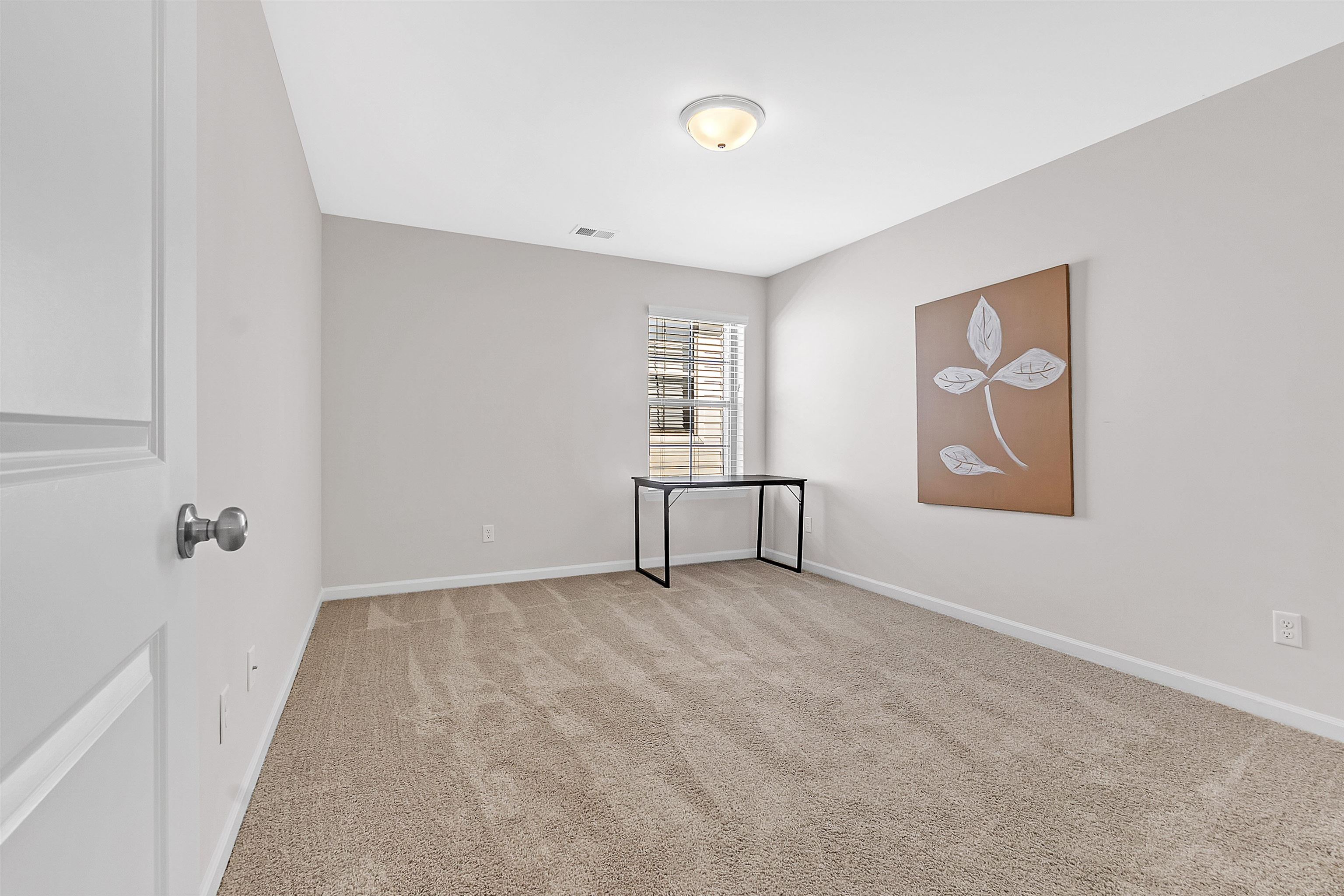 10151 Macon Road Cordova, TN 38018 - Photo 24 of 36 Unfurnished room with light carpet and baseboards