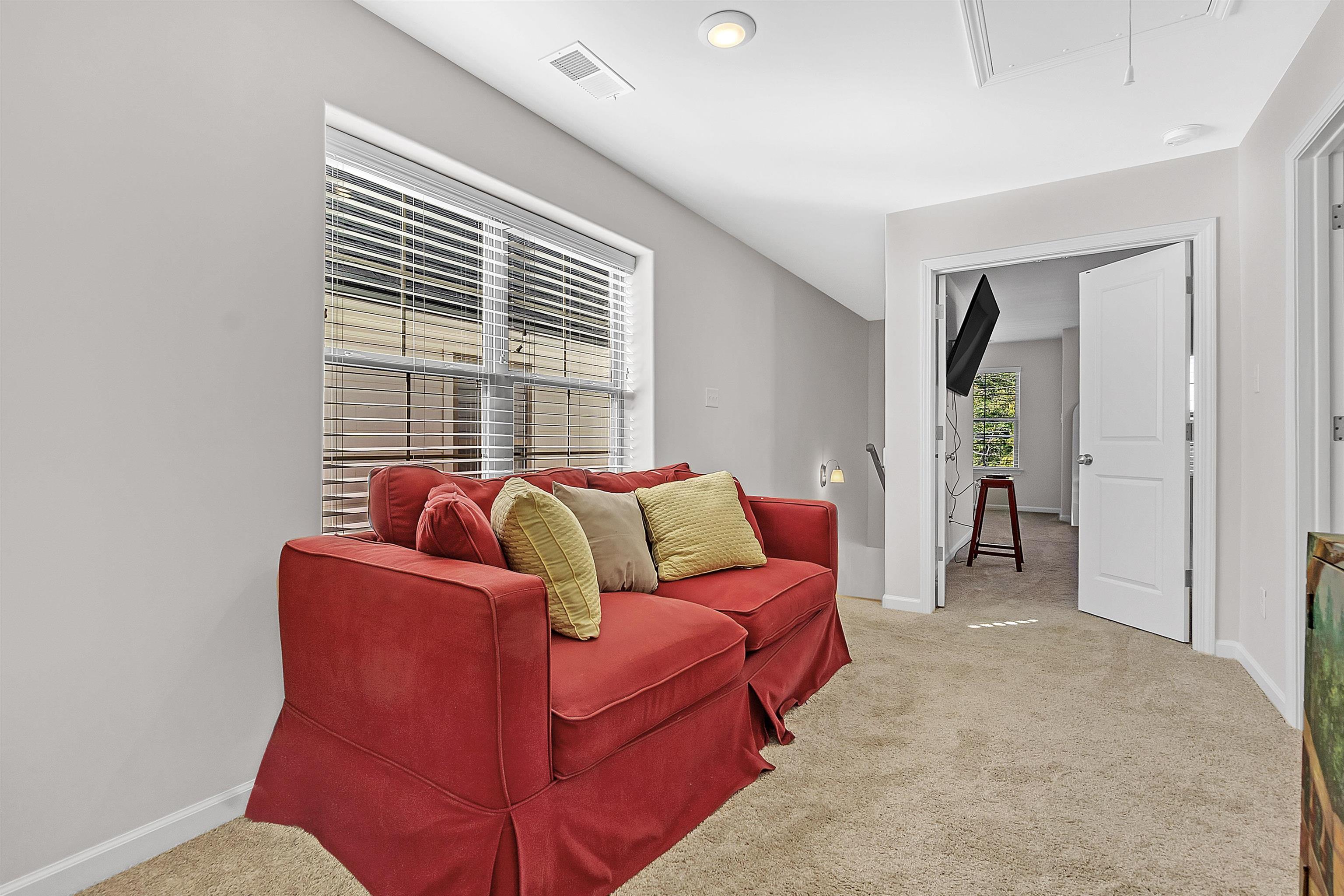 10151 Macon Road Cordova, TN 38018 - Photo 26 of 36 a living room with furniture and a window