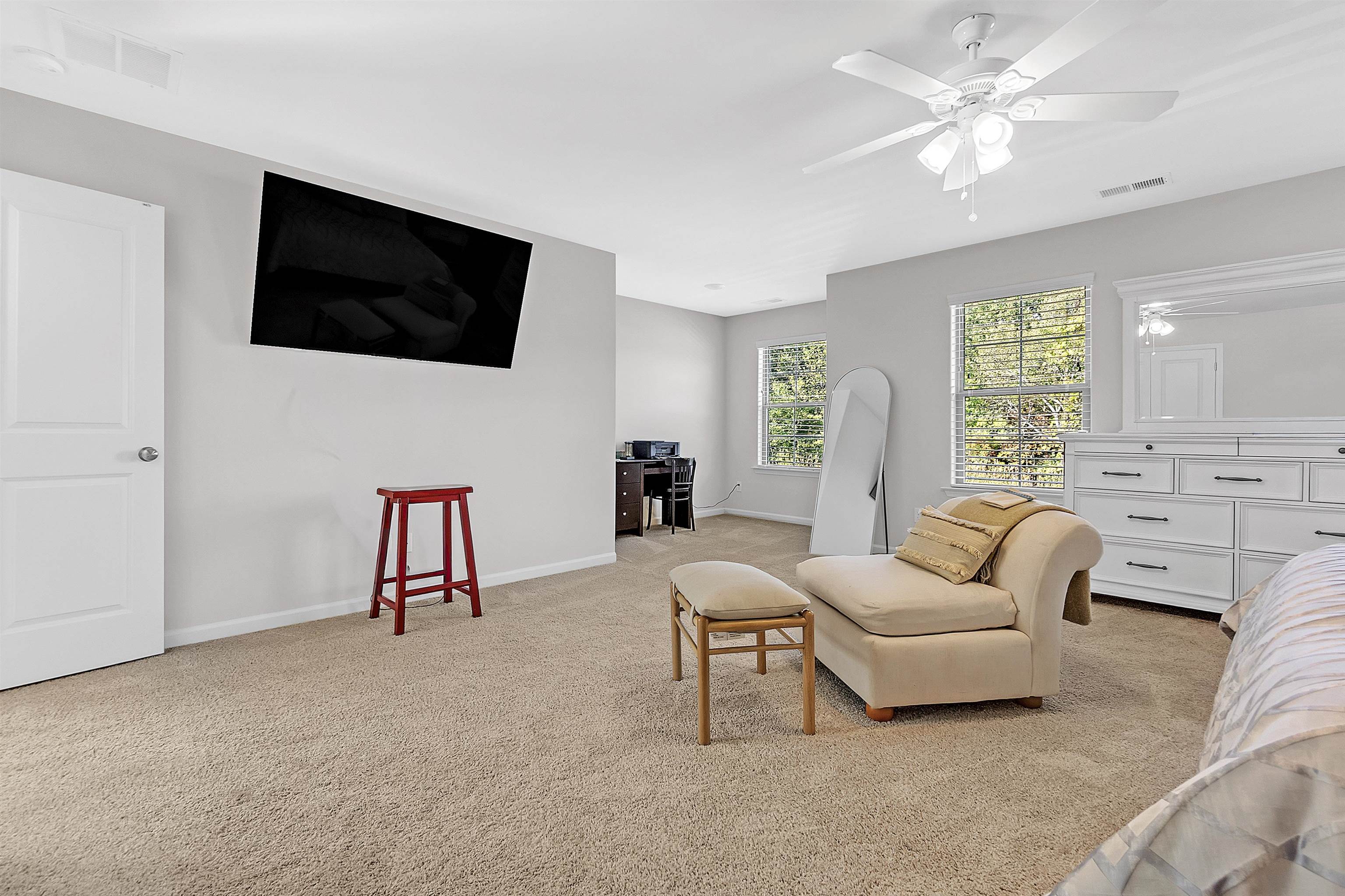 10151 Macon Road Cordova, TN 38018 - Photo 33 of 36 a living room with furniture and a flat screen tv