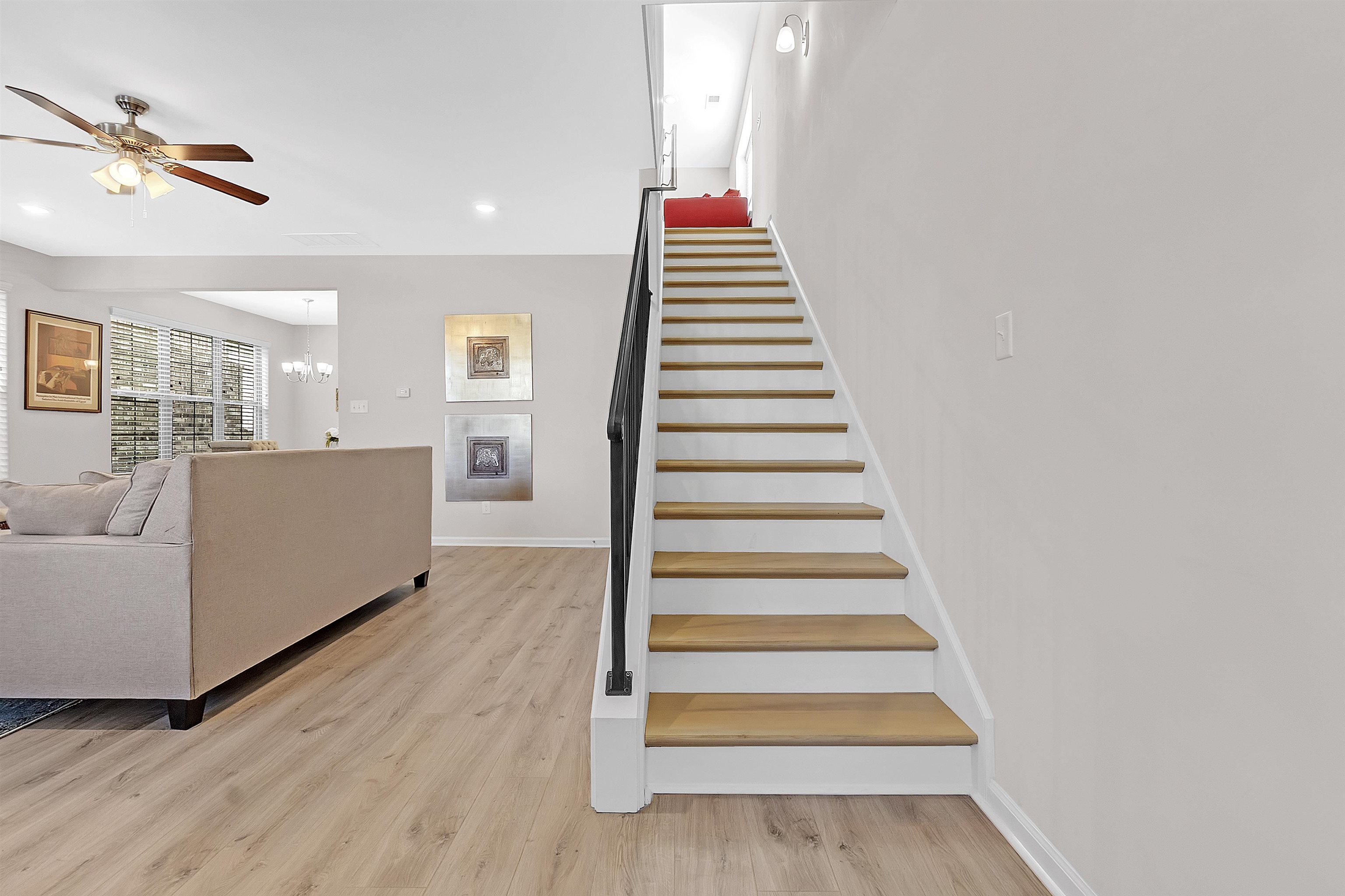 10151 Macon Road Cordova, TN 38018 - Photo 5 of 36 Stairway featuring wood finished floors, a chandelier, a ceiling fan, and recessed lighting
