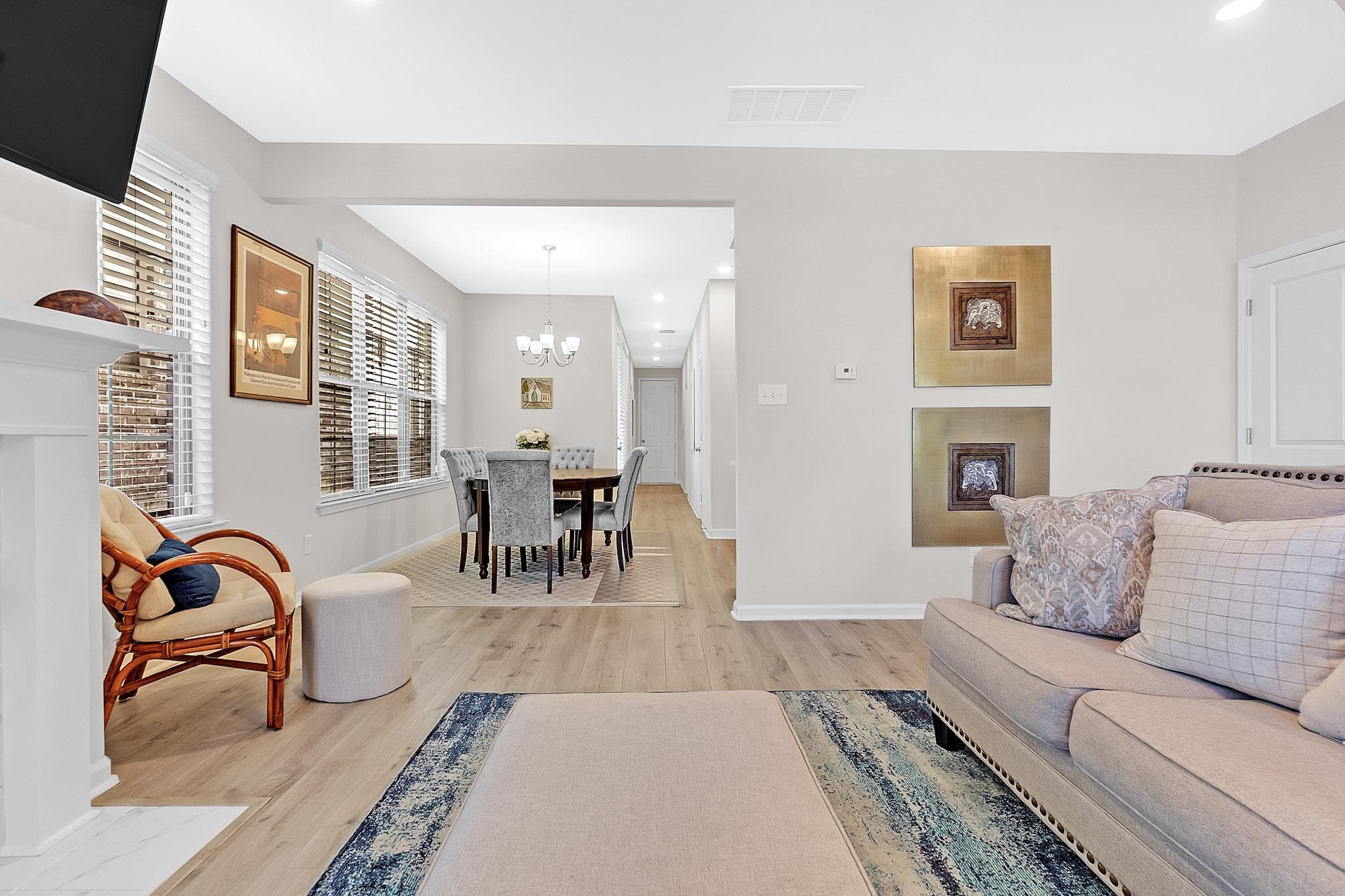 10151 Macon Road Cordova, TN 38018 - Photo 7 of 36 Living area with recessed lighting, light wood-style flooring, and a chandelier