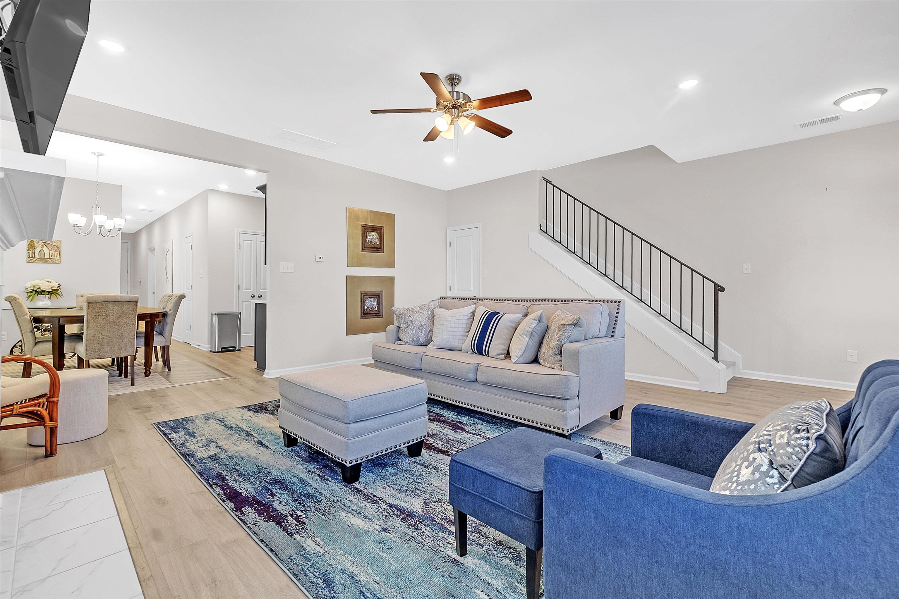 10151 Macon Road Cordova, TN 38018 - Photo 9 of 36 a living room with furniture and wooden floor