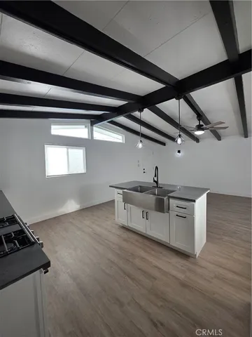 a view of a refrigerator in a room