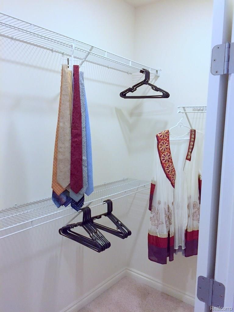 45930 South Stonewood Road Canton, MI 48187 - Photo 10 of 23 10 Master walk in closet - hers.jpg