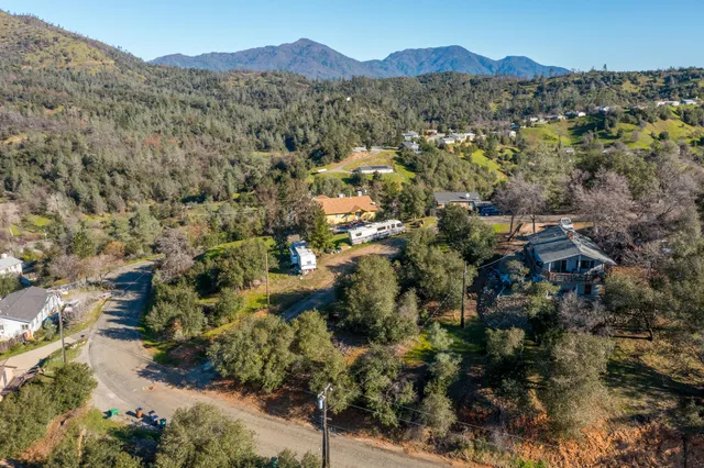 a view of a city with mountain