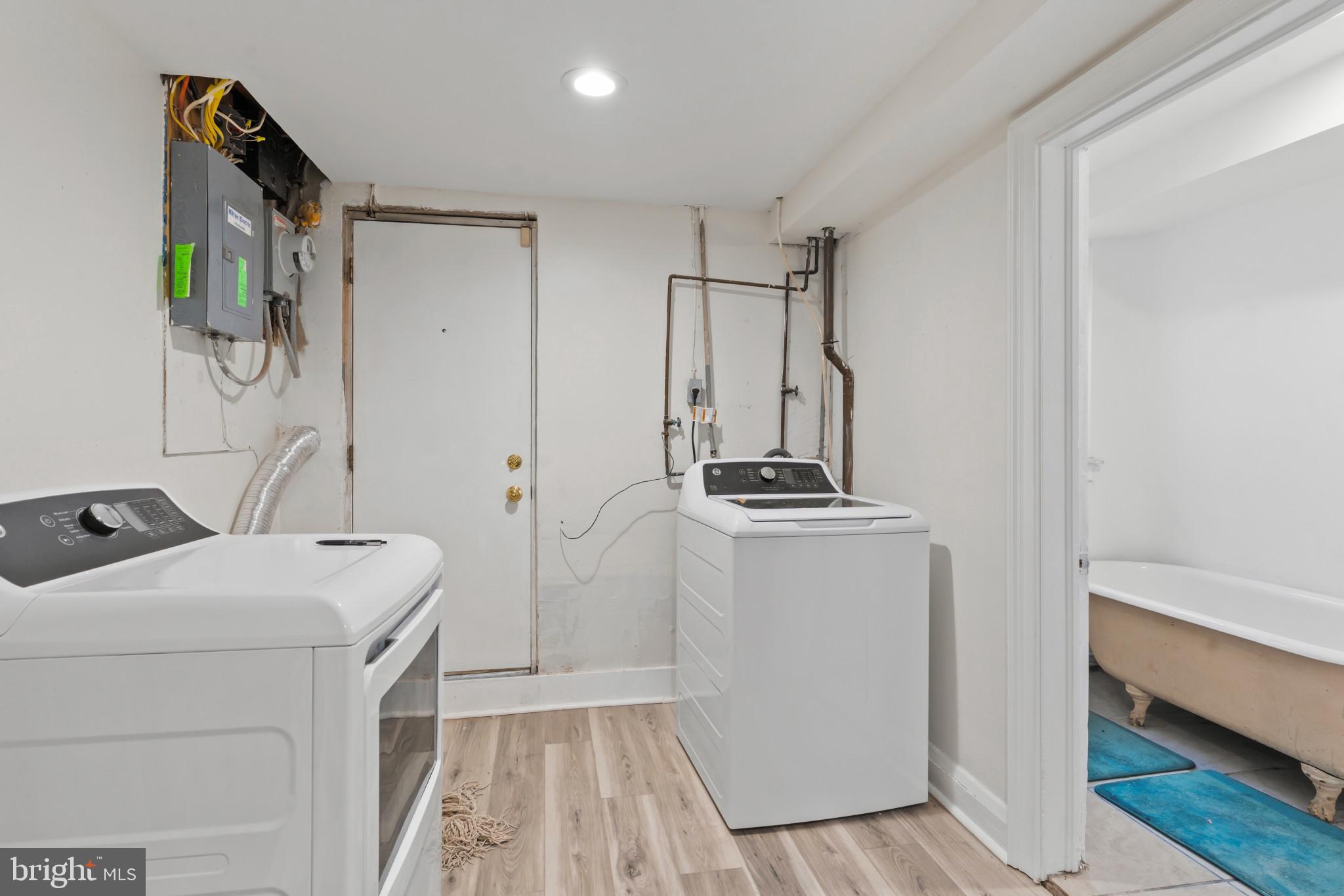2609 East Hoffman Street Baltimore, MD 21213 - Photo 11 of 22 a room with storage and utility