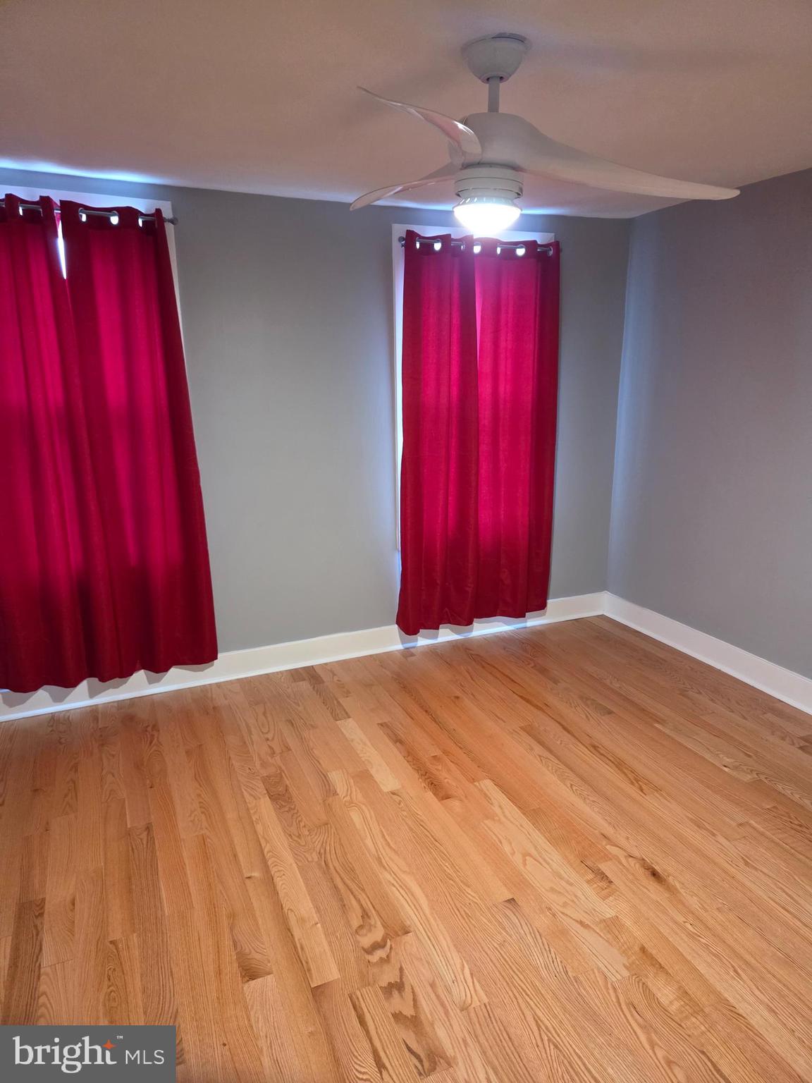 2609 East Hoffman Street Baltimore, MD 21213 - Photo 14 of 22 a view of a room with wooden walls and a window