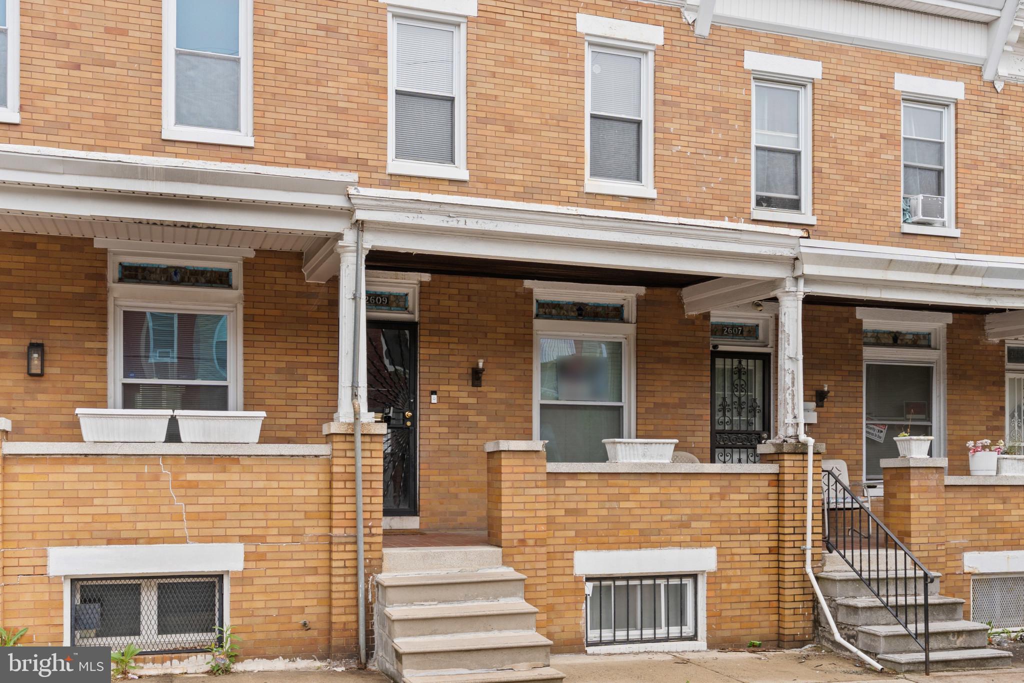 2609 East Hoffman Street Baltimore, MD 21213 - Photo 3 of 22 front view of a brick house