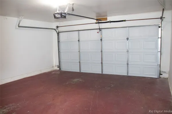 a view of a room with an empty walk in closet