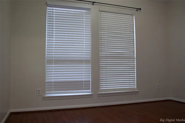 a view of a room that has a window in it
