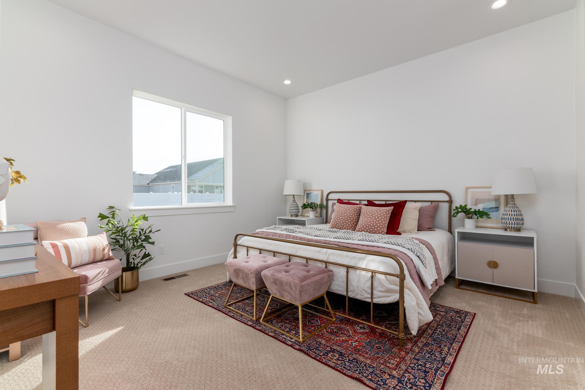 15142 Steel Cloud Avenue Caldwell, ID 83607 - Photo 19 of 44 Carpeted bedroom featuring baseboards and recessed lighting