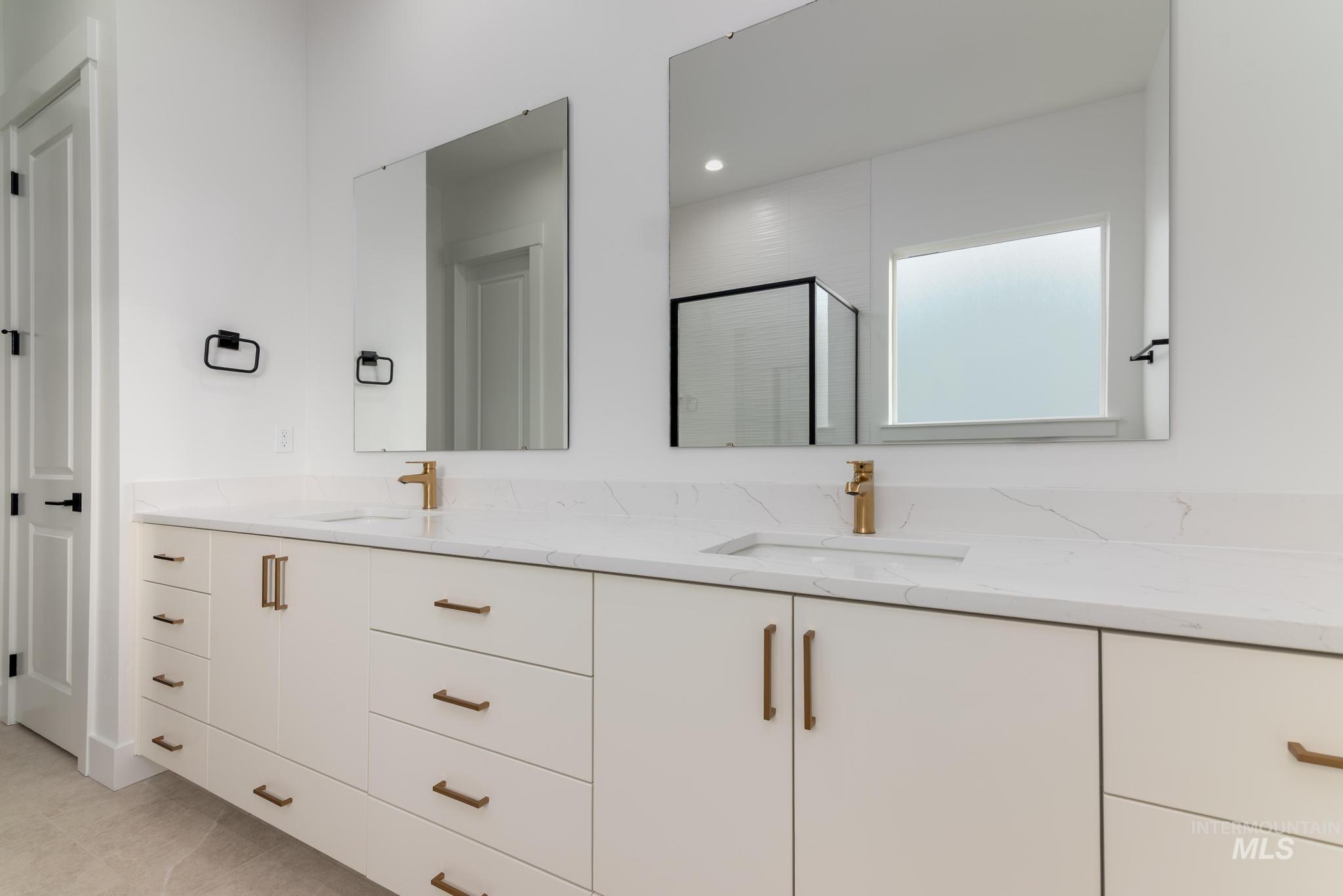 15142 Steel Cloud Avenue Caldwell, ID 83607 - Photo 21 of 44 Full bath with a shower stall and double vanity