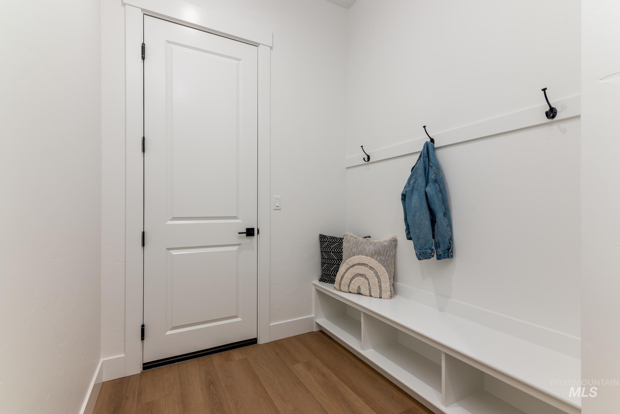 15142 Steel Cloud Avenue Caldwell, ID 83607 - Photo 31 of 44 Mudroom featuring light wood finished floors and baseboards