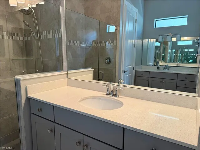 a view of staircase with white walls