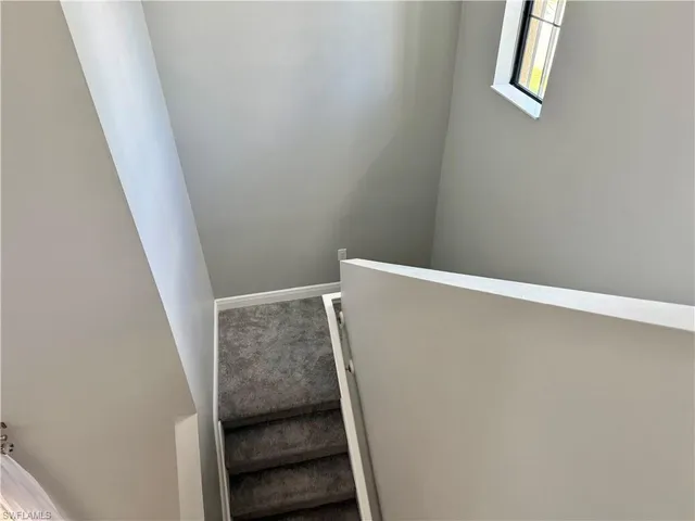 a view of hallway with closet