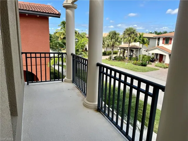 a view of a porch and yard