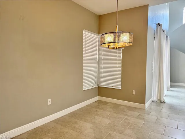 a view of a hallway with a window