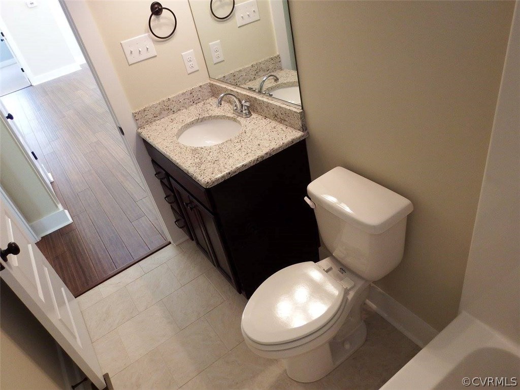 Lot 7 Jay's Road Farmville, VA 23901 - Photo 20 of 36 a bathroom with a toilet sink and mirror