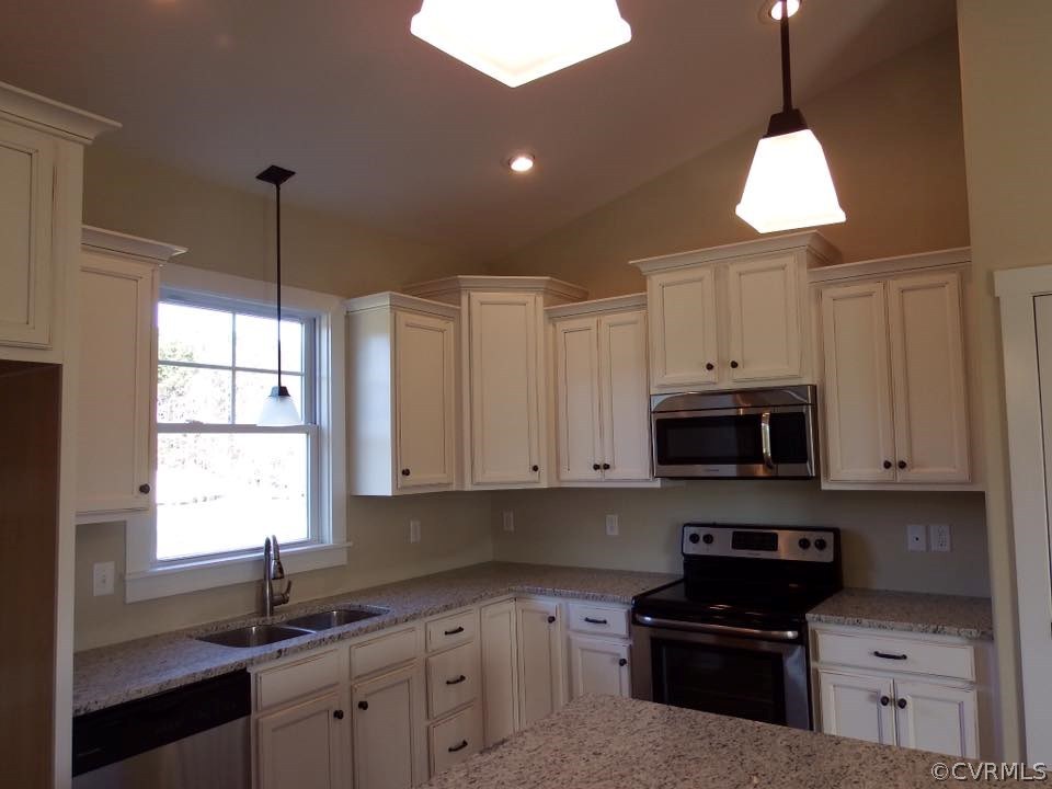 Lot 7 Jay's Road Farmville, VA 23901 - Photo 6 of 36 a kitchen with stainless steel appliances granite countertop white cabinets sink and window