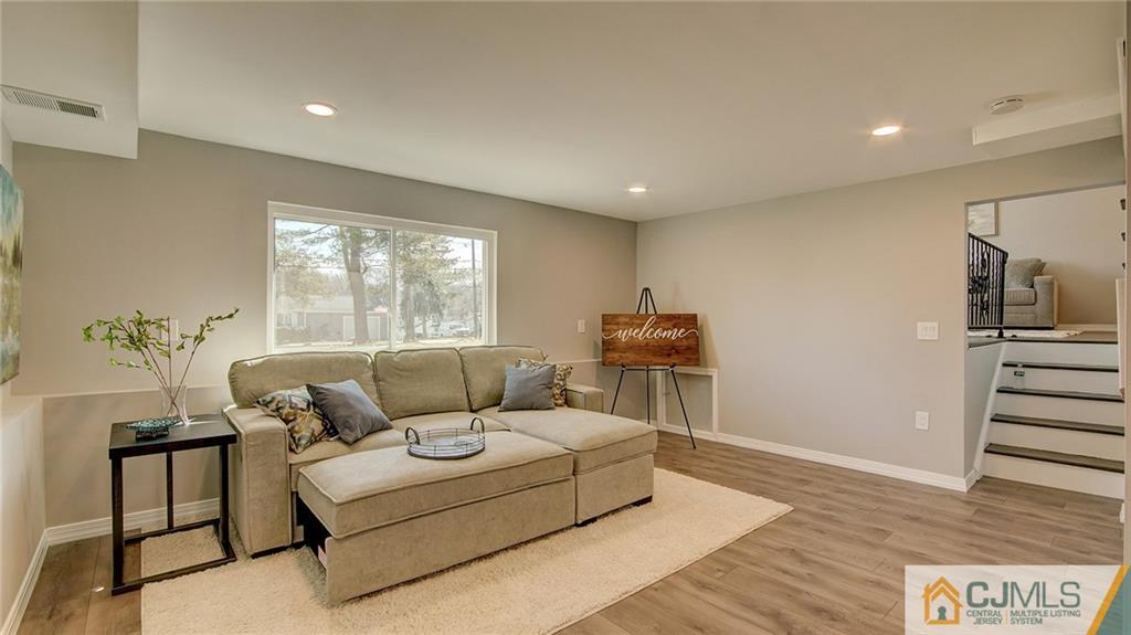 45 Middlesex Road Old Bridge, NJ 07747 - Photo 15 of 35 a living room with furniture and a window