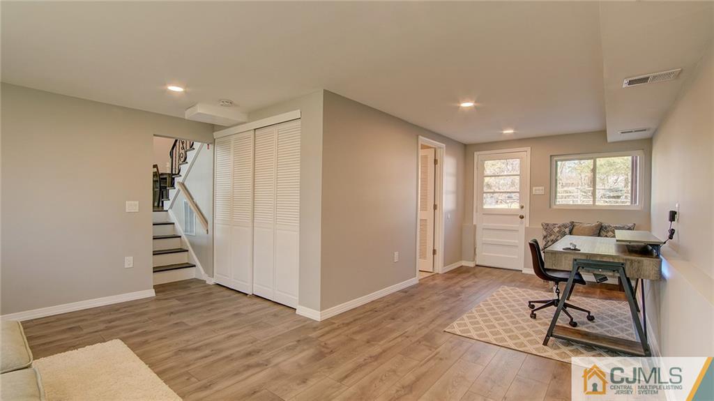 45 Middlesex Road Old Bridge, NJ 07747 - Photo 16 of 35 a view of a livingroom with stairs and furniture