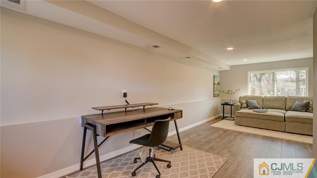 45 Middlesex Road Old Bridge, NJ 07747 - Photo 17 of 35 a living room with furniture and a window