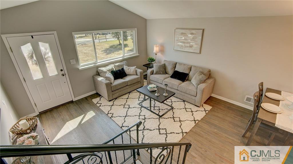 45 Middlesex Road Old Bridge, NJ 07747 - Photo 20 of 35 a living room with furniture and a window